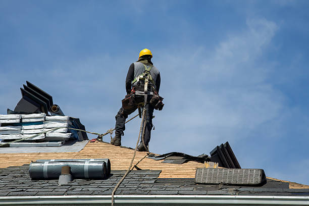 Professional Roofing technician working in Prairie City, IA